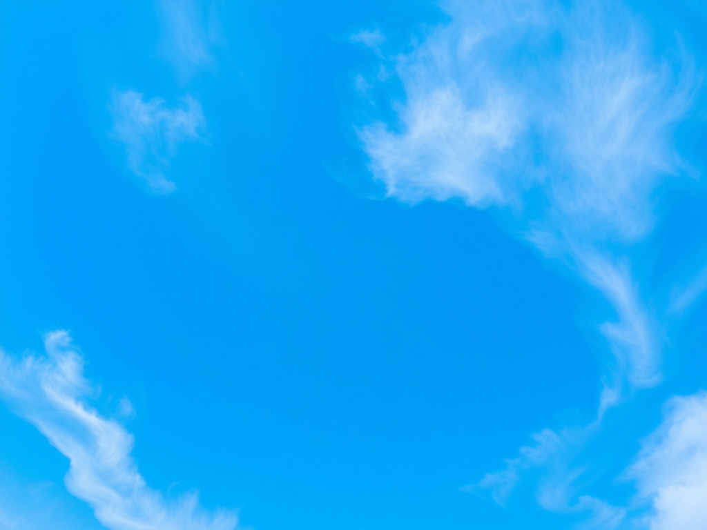 Blue sky with wispy clouds